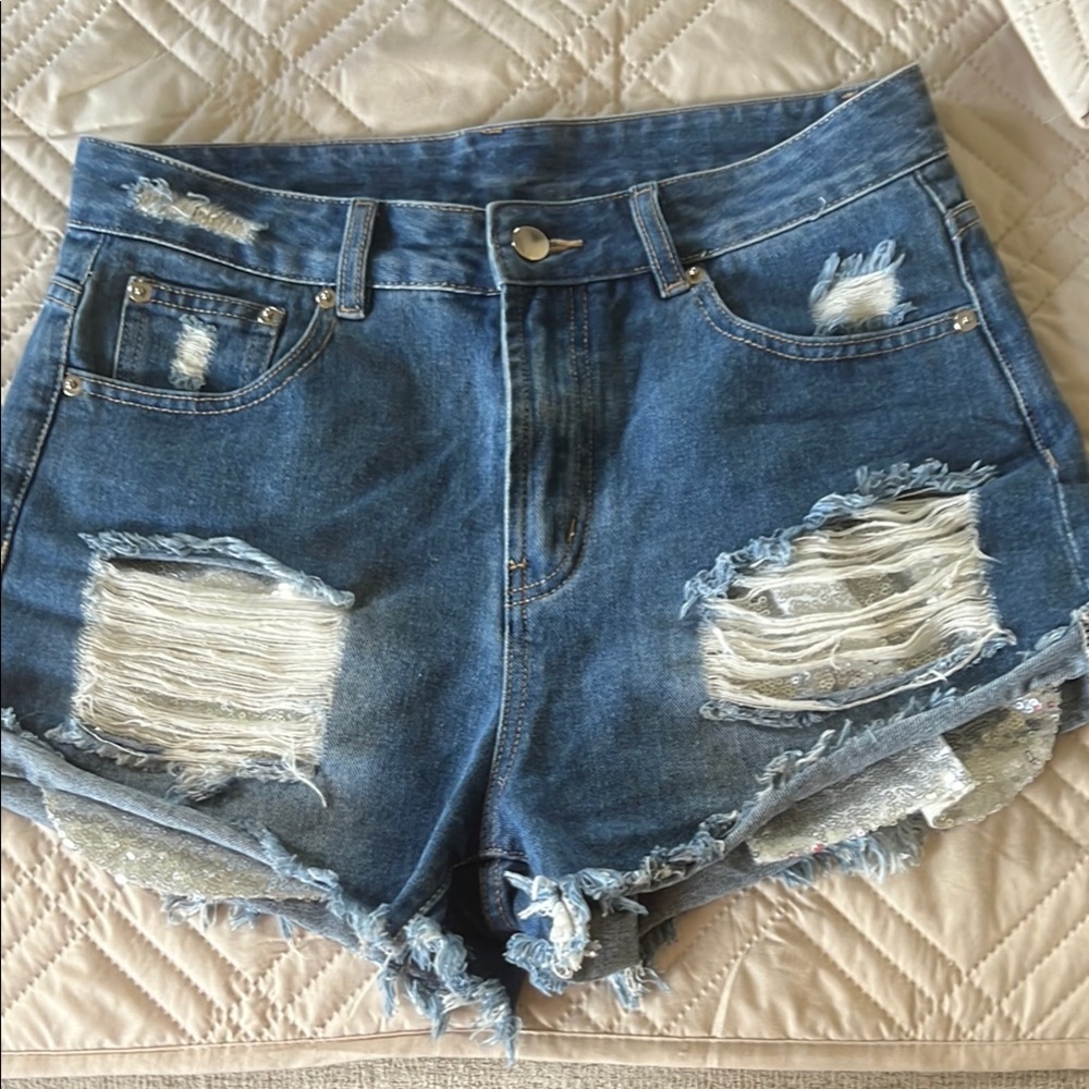 Distressed Denim Women Shorts with silver sequin pockets